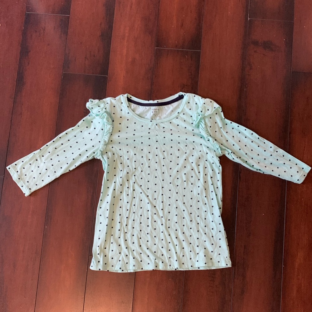Girls mint and navy blue polka dotted shirt